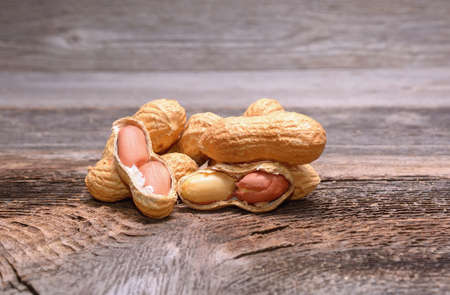 Peanuts on wooden backgroundの写真素材