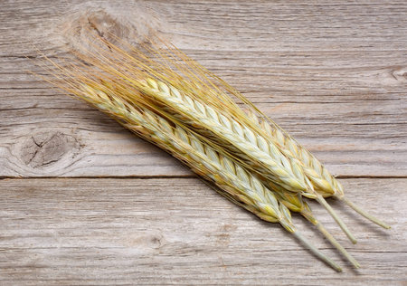 wheat on wooden background