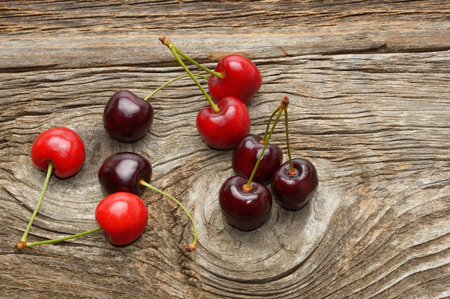 Fresh cherries on wooden table