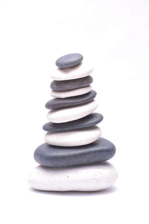 Pile of stones isolated on white backgroundの写真素材