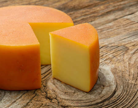 cheese on rustic wooden tableの写真素材