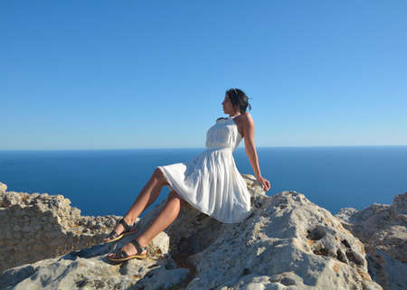 Young woman enjoying the sea. Summer vacation conceptの写真素材