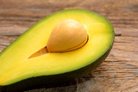 Avocado on woodenの写真素材