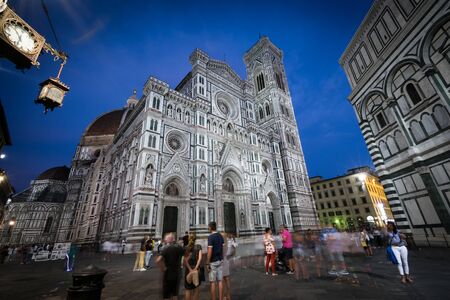 Duomo of Florence in blue hour with people moving aheadの写真素材