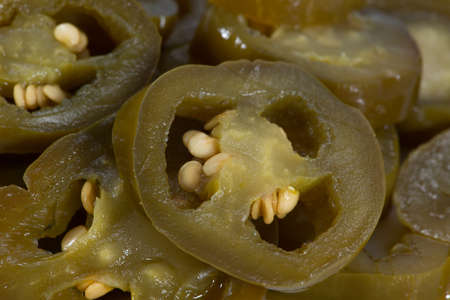 Sliced pickled jalapeno chili peppers chillies with seedsの写真素材