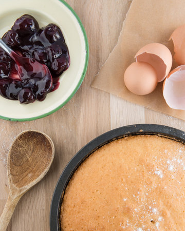 Overhead view of sponge cake being baked