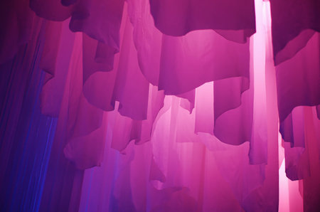 Illuminated cloth hanging in an art installation at Tunel GriÄ in Zagreb, Croatia.