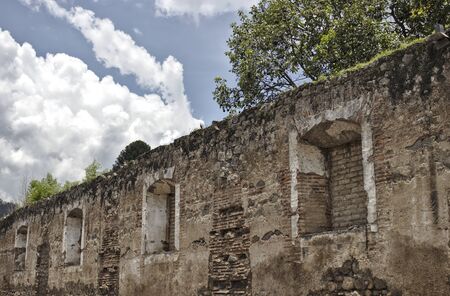 Grungy Stone and Brick Wall Texture Pattern in Earthquake Ruins, Antigua, Guatemala.の写真素材