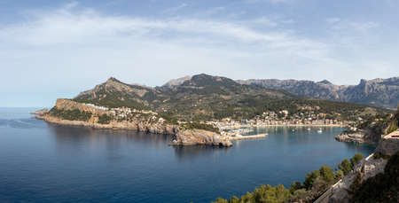 Panoramic view of port de soller with lighthouse and bay, mallorca spain.の写真素材