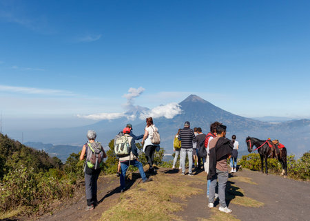 Pacaya Volcano, group of tourist hiker enjoying view of the volcanos fuego acatenango and aguaのeditorial素材