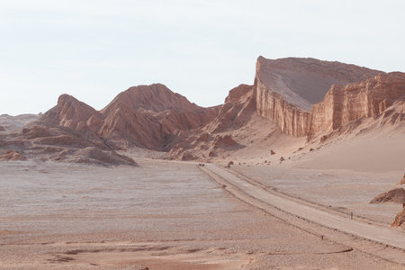 road to amphitheater in Moon Valley or valle de la luna in san pedro de atacama chile.の写真素材