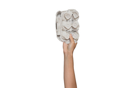 Hand holding cardboard to show fight against environmental pollution and for recycling concept.