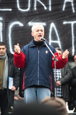 Radu Busila -Â MoldavianÂ Brazilian draughtsÂ player, international Grandmaster since 1996Â and world champion in 1999,Â now memberÂ of the recently-established Committee for Constitution and Democracy ProtectionÂ speaks in front of the protesters in Chisのeditorial素材