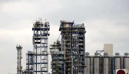 Modern chemical factory with lots of tubes - worldwide industry. Useful file for your annual report, flyer or brochure.の写真素材