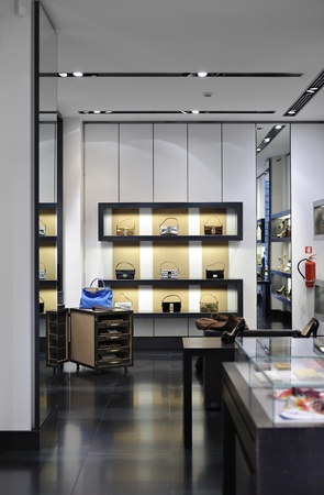 Interior of a boutique store with fashionable luxury women bags and shoes  Useful file for your new mall boutique, VIP store or brand magazine のeditorial素材