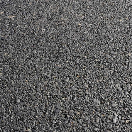 New hot asphalt abstract texture backgroun. Useful file for your brochure, flier and site about road construction, urban services and other needsの写真素材