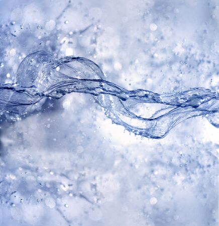 Studio shot of splashing water  Useful file for your brochure, flyer, website advertising about healthy lifestyle and other needsの写真素材