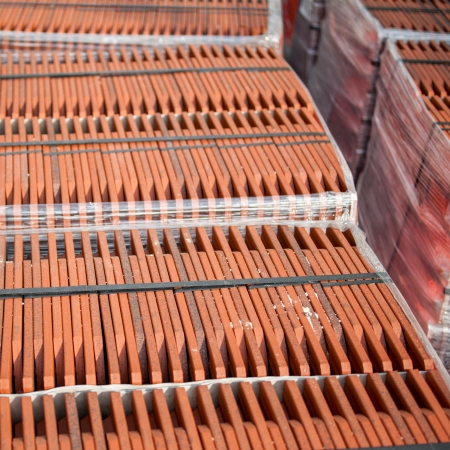 Stack of roofing tiles at factoryの写真素材