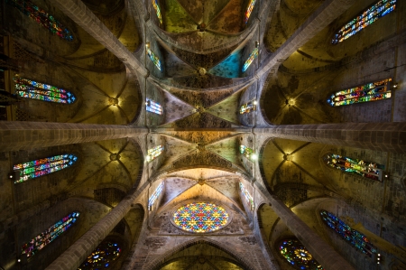 Interior of Cathedral of Santa Maria of Palma (La Seu) in Palma de Mallorca (Majorca) showing top and rose windowのeditorial素材