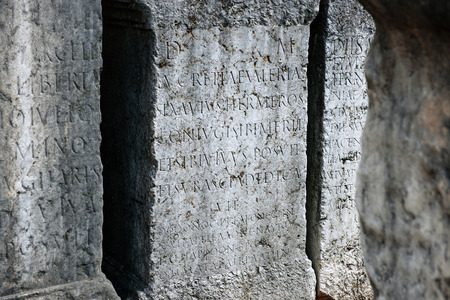 Roman tomb plates with latin inscription in ancient cemeteryの写真素材