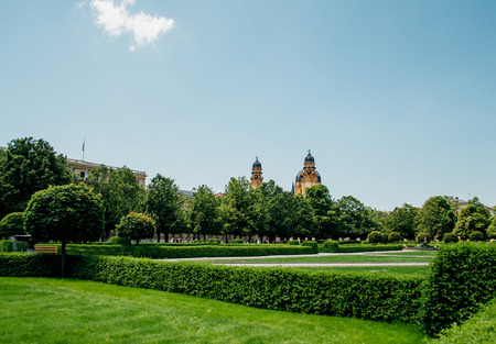 Hofgarten - Court Garden - is a garden in the center of Munich, Germany, located between the Residenz and the Englischer Garten. Clear sky and perfect green german meadowsのeditorial素材