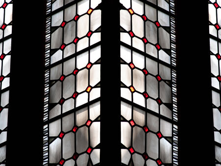 Multicolored nacre pearl stained glass window in symmetric patternの写真素材