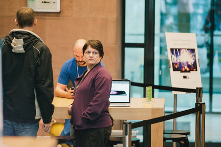 STRASBOURG, FRANCE - SEPTEMBER 19, 2014: Woman waiting the queue for the purchase of an iPhone 6...