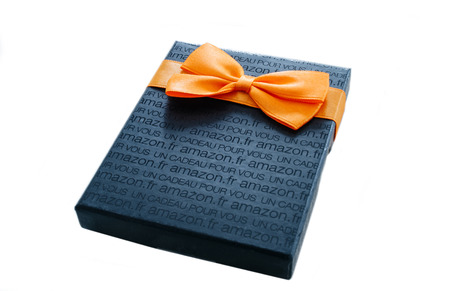 LONDON, UNITED KINGDOM -JANUARY 18: Close-up of Amazon Gift Card box isolated on white. Amazon Gift Box with A greeting Card is delivered in one-day shipping through the world and is available to purchase million of products from the online retailerのeditorial素材