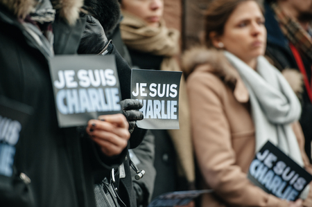 STRASBOURG, FRANCE - JANUARY 09, 2015: Council of Europe employees and Thorbjorn Jagland - Secretary General of the CE attend to a silent vigil to condemn the gun attack at French satirical magazine Charlie Hebdo office in Paris, which killed 12 people onのeditorial素材