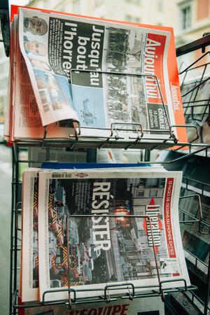 STRASBOURG, FRANCE - 10 JAN, 2015: The front covers of International newspapers display headlining the terrorist attacks yesterday in Paris on January 8, 2015のeditorial素材