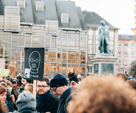 STRASBOURG, FRANCE - 11 JAN, 2015:  People hold placards reading 'Je suis Charlie' during a unity rally (Marche Republicaine) where some 50000 people took part in tribute three-day killing spree in Parisのeditorial素材