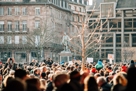 STRASBOURG, FRANCE - 11 JAN, 2015:  People gather for a unity rally (Marche Republicaine) in Place du General Kleber in tribute three-day killing spree in Parisのeditorial素材