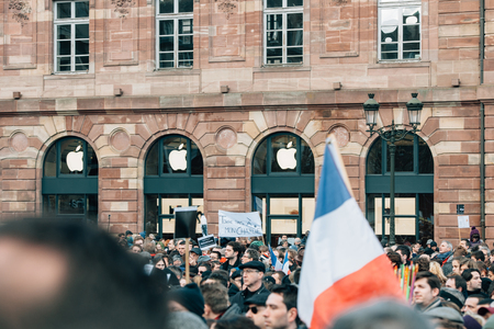 STRASBOURG, FRANCE - 11 JAN, 2015:  People hold placards reading 'Don't touch my Charlie' during a unity rally (Marche Republicaine) where some 50000 people took part in tribute three-day killing spree in Parisのeditorial素材