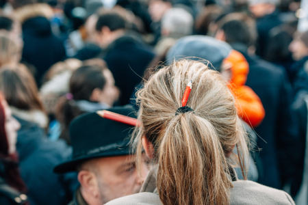 STRASBOURG, FRANCE - 11 JAN, 2015:  Woman with peincil in her hair during a unity rally (Marche Republicaine) where some 50000 people took part in tribute three-day killing spree in Parisのeditorial素材