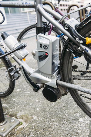 FRANKFURT, GERMANY - MARCH 03, 2014: Electric bicycle motor detail in urban environment. In Germany they are gaining in popularity and taking some market share away from conventional bicyclesのeditorial素材