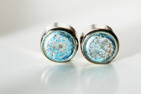 Coin batteries corroded on white backgroundの写真素材