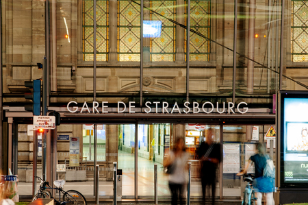 STRASBOURG, FRANCE - 30 JUNE 2010: Silhouettes in front of main entrance to Gare de Strasbourg - or Strasbourg train station located in Place de la Gare. It is the eastern terminus of the ParisâStrasbourg railway.のeditorial素材