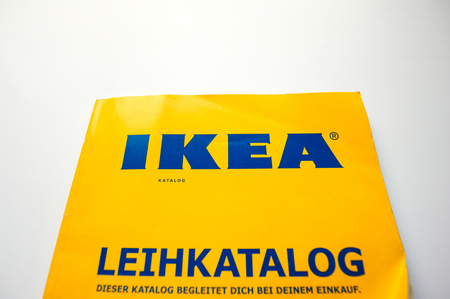 FRANKFURT AM MAIN, GERMANY - MAY 15, 2011: The IKEA Catalogue on white bakcground. It is a catalogue published annually by the Swedish home furnishing retailer and was first published in Swedish in 1951. Worldwide, approximately 208 million copies of the のeditorial素材