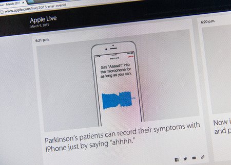 PARIS, FRANCE - MAR 9, 2015: Apple Computers event keynote tweets close up seen on iMac with request for Parkinson's patient to record theyr symtoms with iPhone as seen on 9 March, 2015のeditorial素材