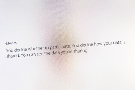 PARIS, FRANCE - MAR 9, 2015: Apple Computers event keynote tweets close up seen on iMac with you deceide whether to participate and how your data is shared about Health App as seen on 9 March, 2015のeditorial素材