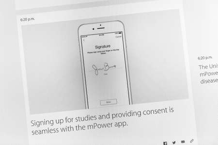 PARIS, FRANCE - MAR 9, 2015: Apple Computers event keynote tweets close up seen on iMac with the app and signature giving consent for medical studies as seen on 9 March, 2015のeditorial素材