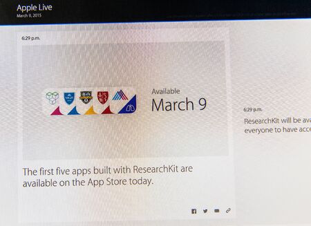 PARIS, FRANCE - MAR 9, 2015: Apple Computers event keynote tweets close up seen on iMac with the first five App in AppStore built with ResearchKit as seen on 9 March, 2015のeditorial素材