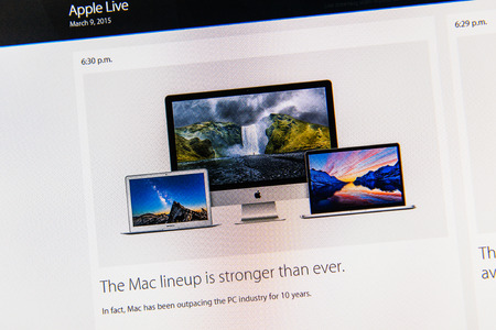 PARIS, FRANCE - MAR 9, 2015: Apple Computers event keynote tweets close up seen on iMac with the Mac lineup is stronger than ever featuring MacBook Air, Mac Book Pro Retina and iMac as seen on 9 March, 2015のeditorial素材