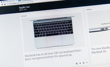 PARIS, FRANCE - MAR 9, 2015: Apple Computers event keynote tweets close up seen on iMac with the newly launched  MacBook featuring full-size keyboard reengineered from the ground as seen on 9 March, 2015のeditorial素材