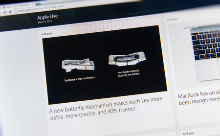 PARIS, FRANCE - MAR 9, 2015: Apple Computers event keynote tweets close up seen on iMac with the newly launched MacBook Retina keyboard butterfly mechanism for a more stable and more precise keyboard button as seen on 9 March, 2015のeditorial素材