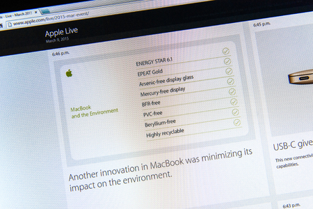 PARIS, FRANCE - MAR 9, 2015: Apple Computers event keynote tweets close up seen on iMac with the new MacBook and its environmental impact as seen on 9 March, 2015のeditorial素材