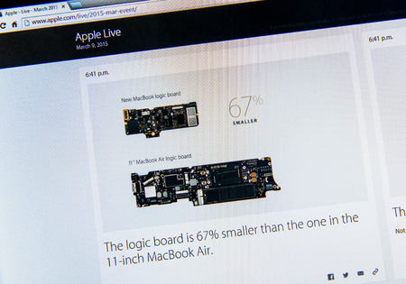 PARIS, FRANCE - MAR 9, 2015: Apple Computers event keynote tweets close up seen on iMac comparing new and old logic board  as seen on 9 March, 2015のeditorial素材