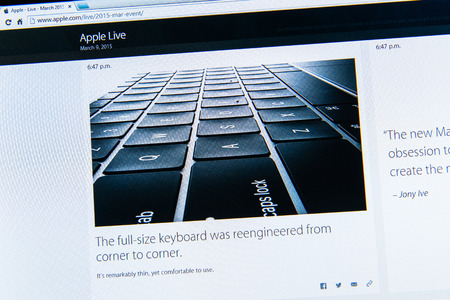 PARIS, FRANCE - MAR 9, 2015: Apple Computers event keynote tweets close up seen on iMac with the newly launched thin keyboard on a MacBook Retina as seen on 9 March, 2015のeditorial素材