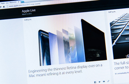 PARIS, FRANCE - MAR 9, 2015: Apple Computers event keynote tweets close up seen on iMac with the newly launched MacBook Retina layered - thinnest Retina display as seen on 9 March, 2015のeditorial素材
