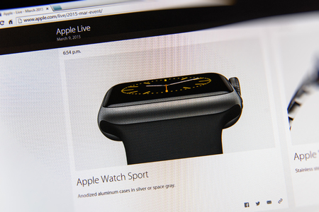 PARIS, FRANCE - MAR 9, 2015: Apple Computers event keynote tweets close up seen on iMac display with the newly launched Apple Watch Sport made from anodize aluminum case as seen on 9 March, 2015のeditorial素材